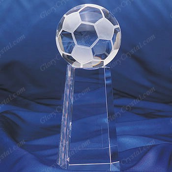optical crystal soccer paperweight with a tall crystal base