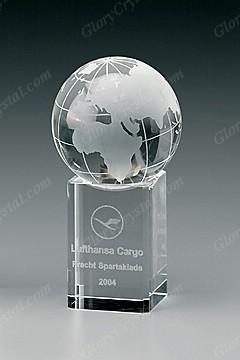 Optical crystal globe on a tall crystal base, optic crystal globe paperweight with an engraved base, custom crystal globe award, crystal glass globe trophy. 