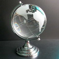 crystal globe on a silver metal stand base