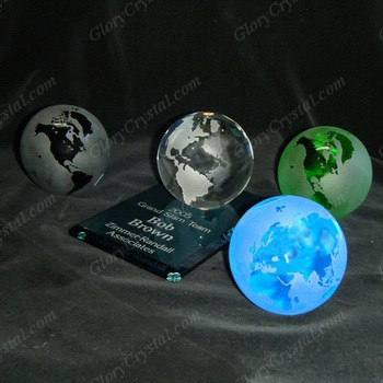 Colored crystal globes, colored glass globes, blue crystal globes, black crystal globes, green crystal globes, red crystal globes, golden crystal globes, purple crystal globes, pink crystal globes, clear crystal globes. 